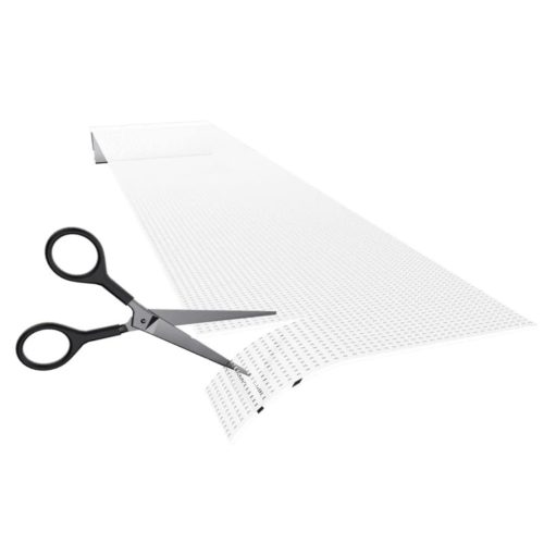 Transparent LED crystal film screen being cut to size with a pair of scissors