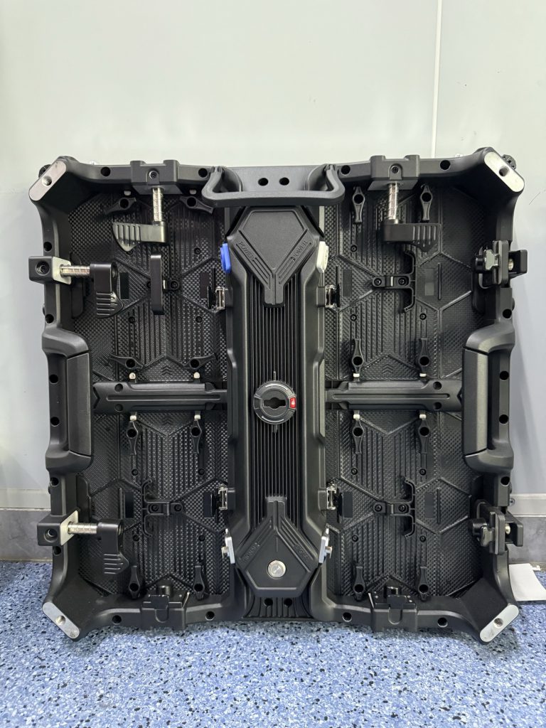Rear of 500 x 500 mm portable rental LED video wall panel showing die-cast quick-lock frame and handles